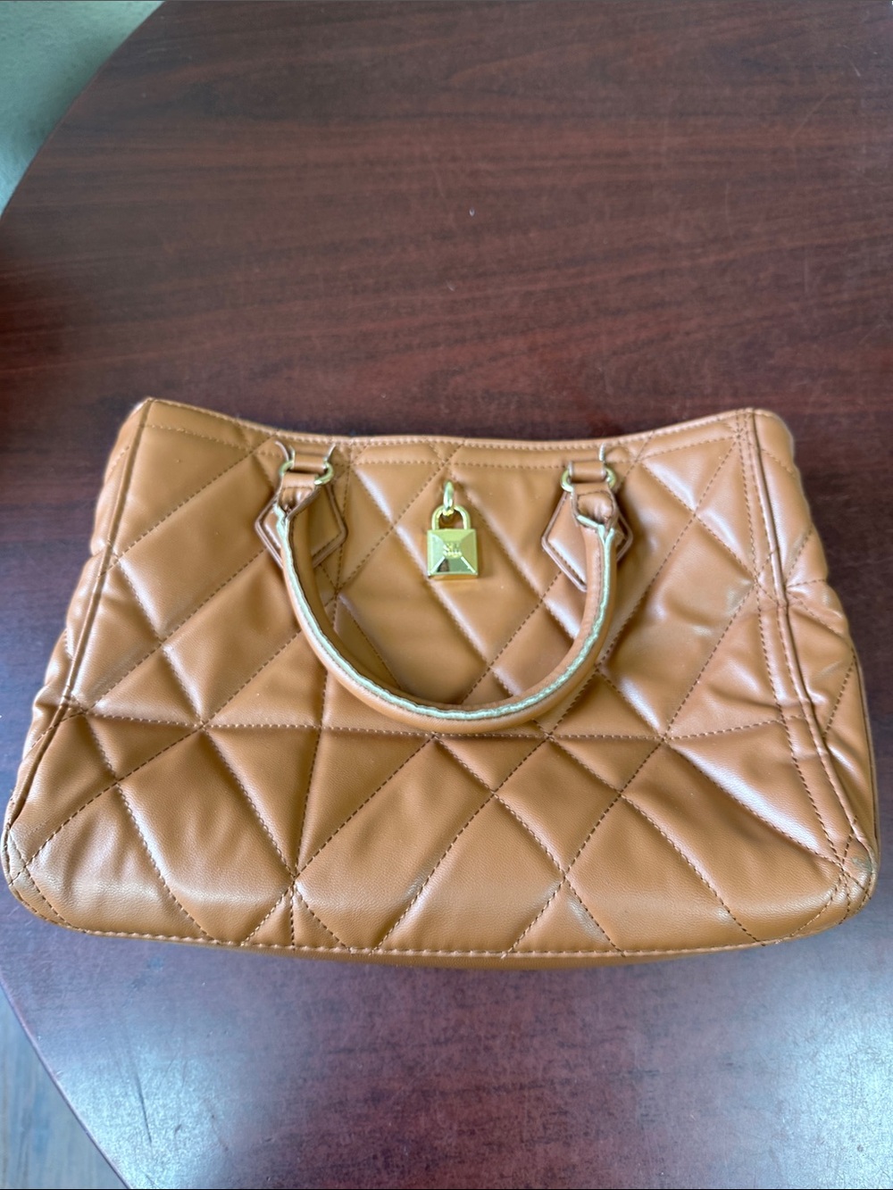 ##750, Steve Madden Quilted Tan Satchel with Gold Lock Accent